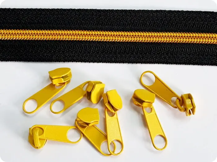 ZAMEK, TAŚMA SUWAKOWA CZARNO ŻÓŁTO-ZŁOTA 5 mm + 1 suwak