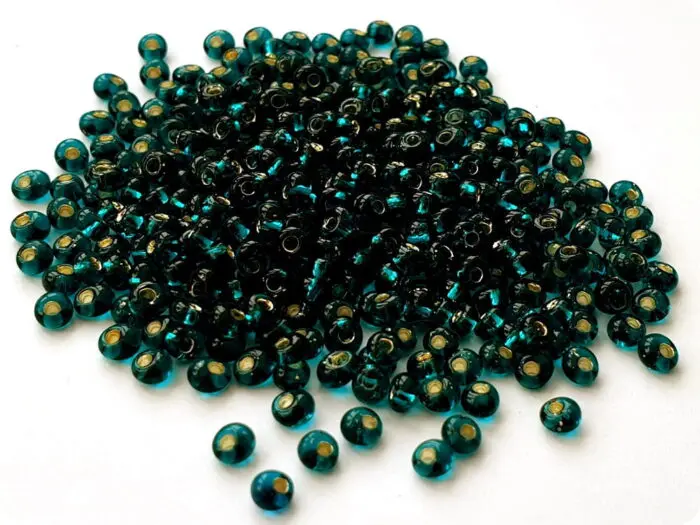 KORALIKI TOHO TM-03 SILVER LINED teal (27BD) 10g