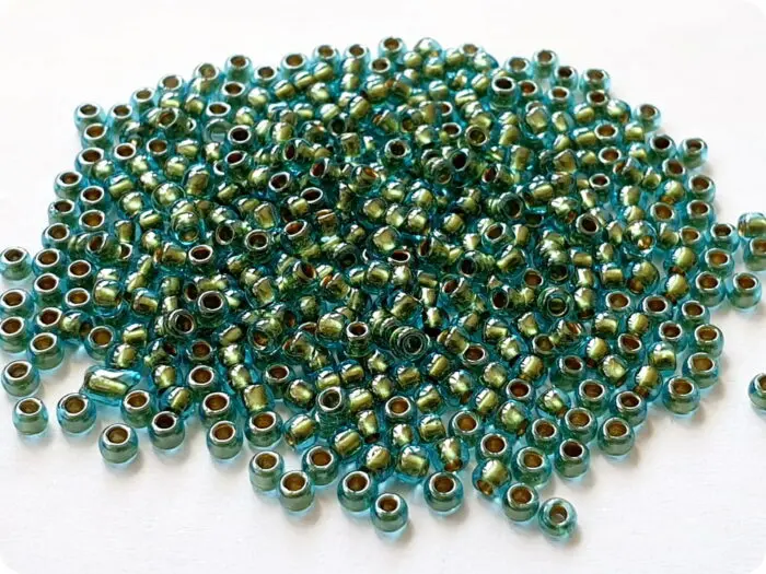 KORALIKI TOHO 8/0 INSIDE COLOR aqua/gold (284) 10g