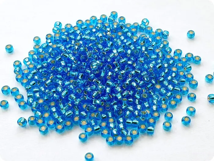 KORALIKI TOHO 8/0 SILVER LINED dark aqua (23B) 10g