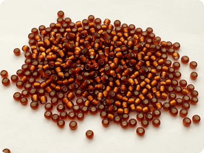 KORALIKI TOHO 8/0 SILVER LINED frosted smoky topaz (34F) 10g