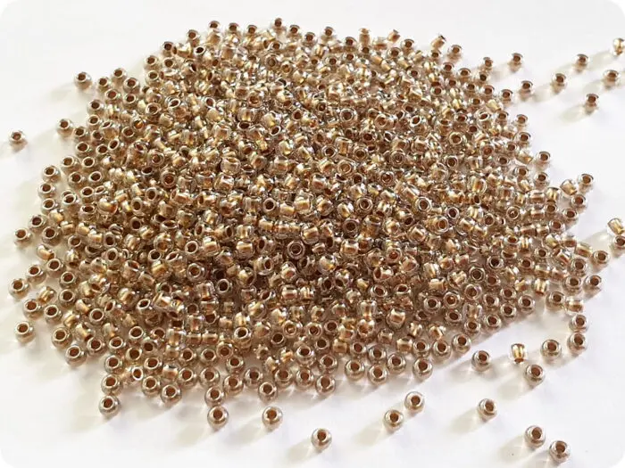 KORALIKI TOHO 11/0 GOLD LINED crystal (989) 10g