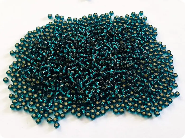 KORALIKI TOHO 11/0 SILVER LINED teal (27BD) 10g