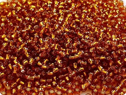 KORALIKI TOHO 11/0 SILVER LINED topaz (22C) 10g