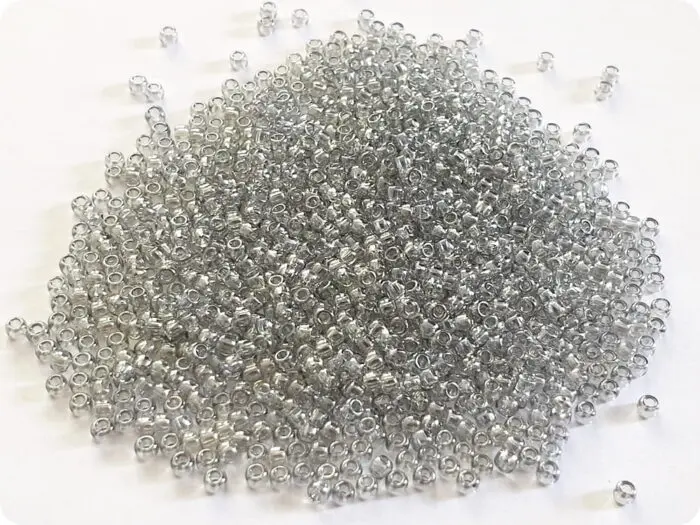 KORALIKI TOHO 11/0 TRANSPARENT lt gray (112) 10g