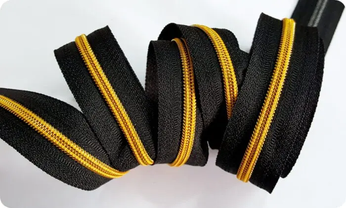 ZAMEK, TAŚMA SUWAKOWA CZARNO ŻÓŁTO-ZŁOTA 5 mm + 1 suwak