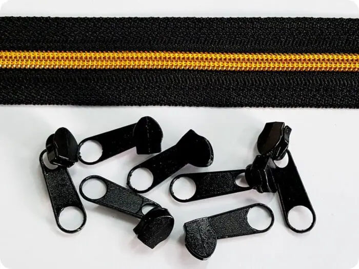 ZAMEK, TAŚMA SUWAKOWA CZARNO ŻÓŁTO-ZŁOTA 5 mm + 1 suwak