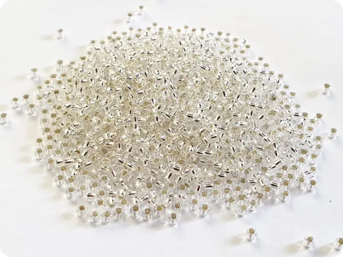 KORALIKI TOHO 8/0 SILVER LINED crystal (21) 10g