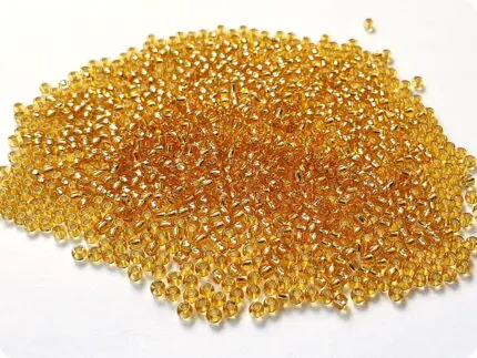 KORALIKI TOHO 8/0 SILVER LINED topaz (22) 10g