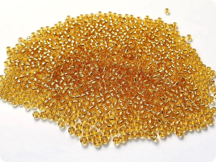 KORALIKI TOHO 8/0 SILVER LINED topaz (22) 10g